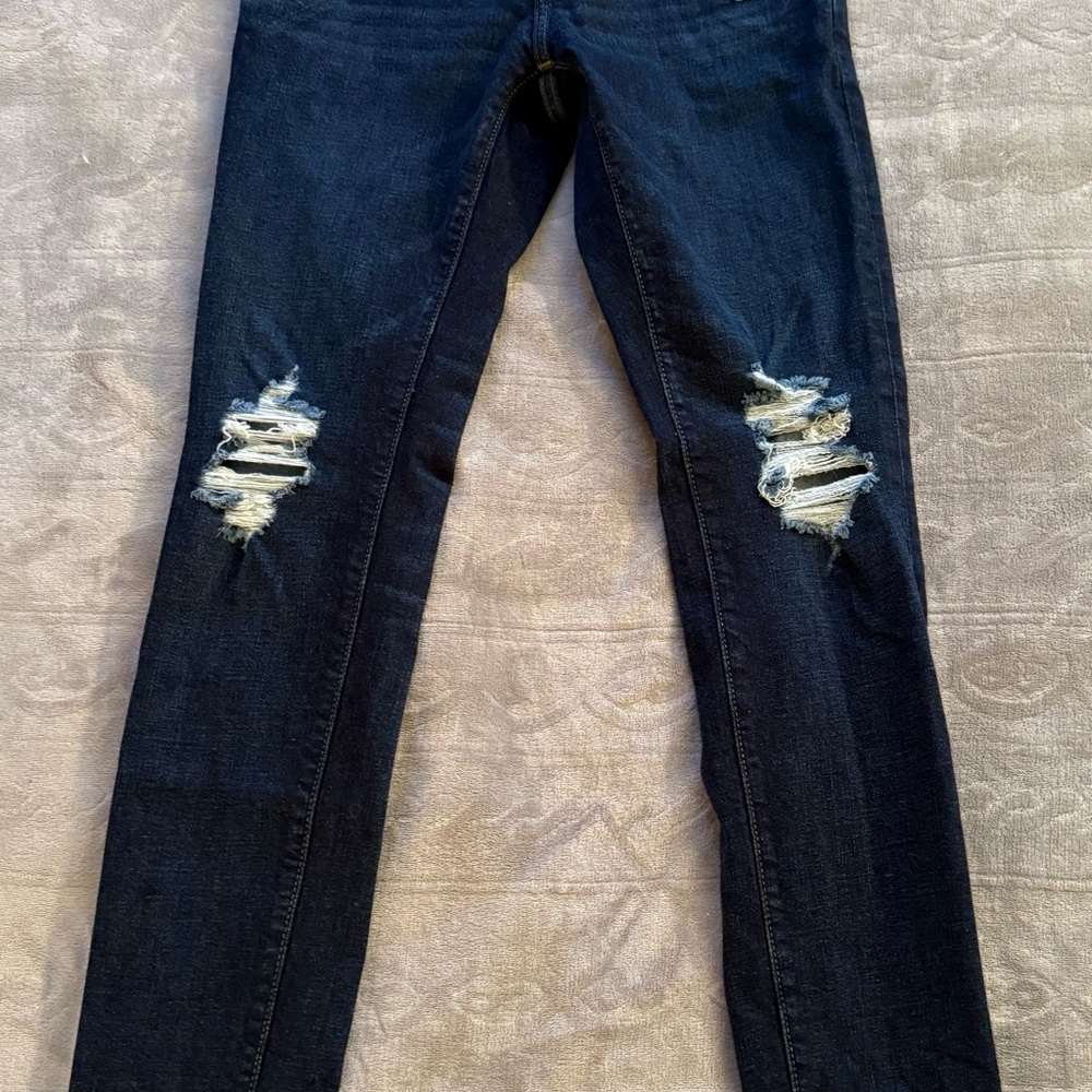 Distressed Blue Jeans
